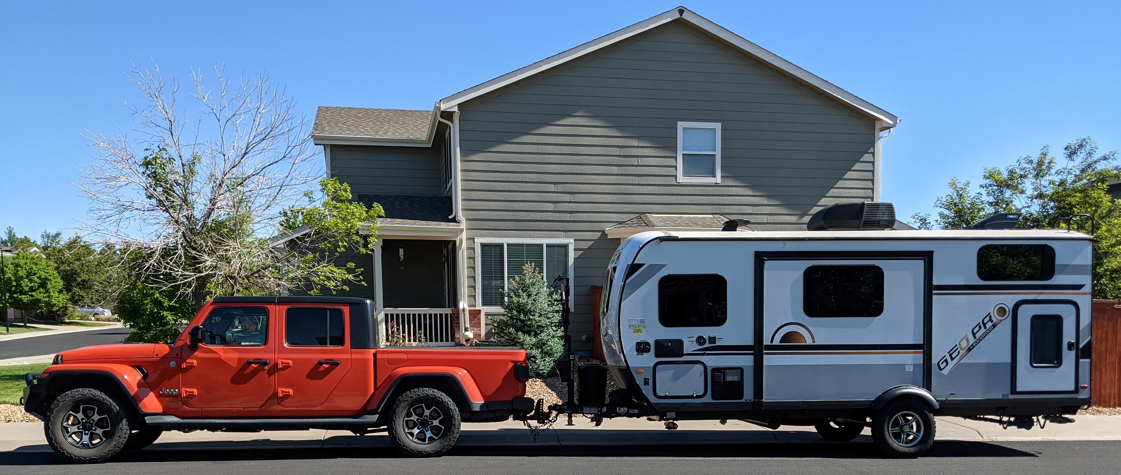 Our Gladiator towing the GeoPro G20BHS camper.