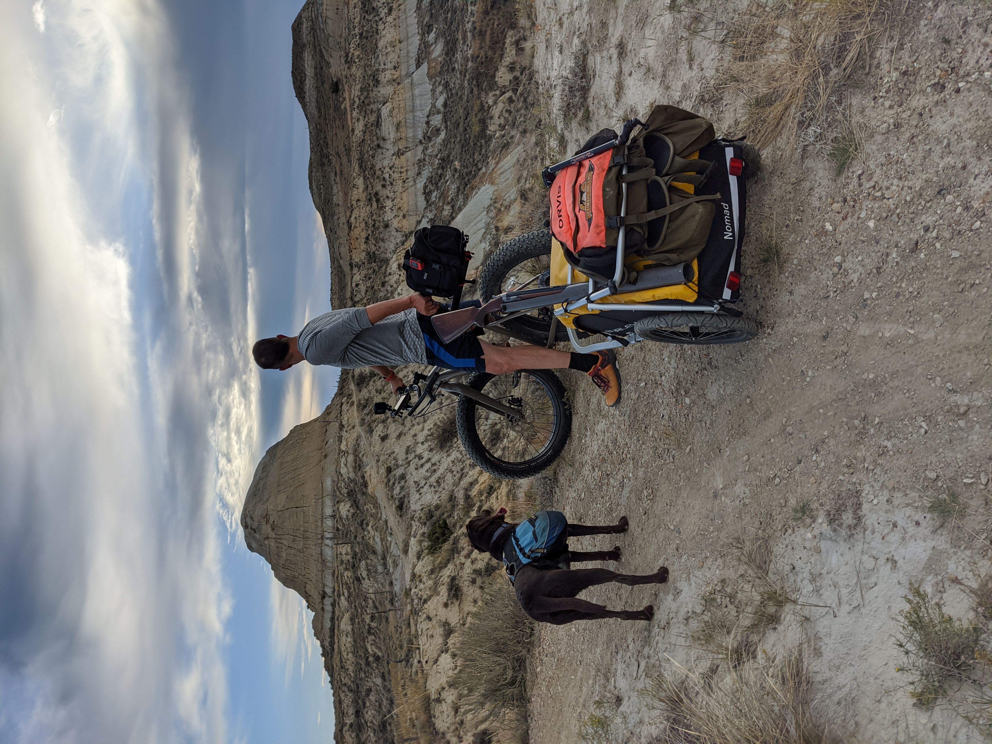 Brian and his lab Ida on their fat tire bike on the Maah Daah Hey Trail.