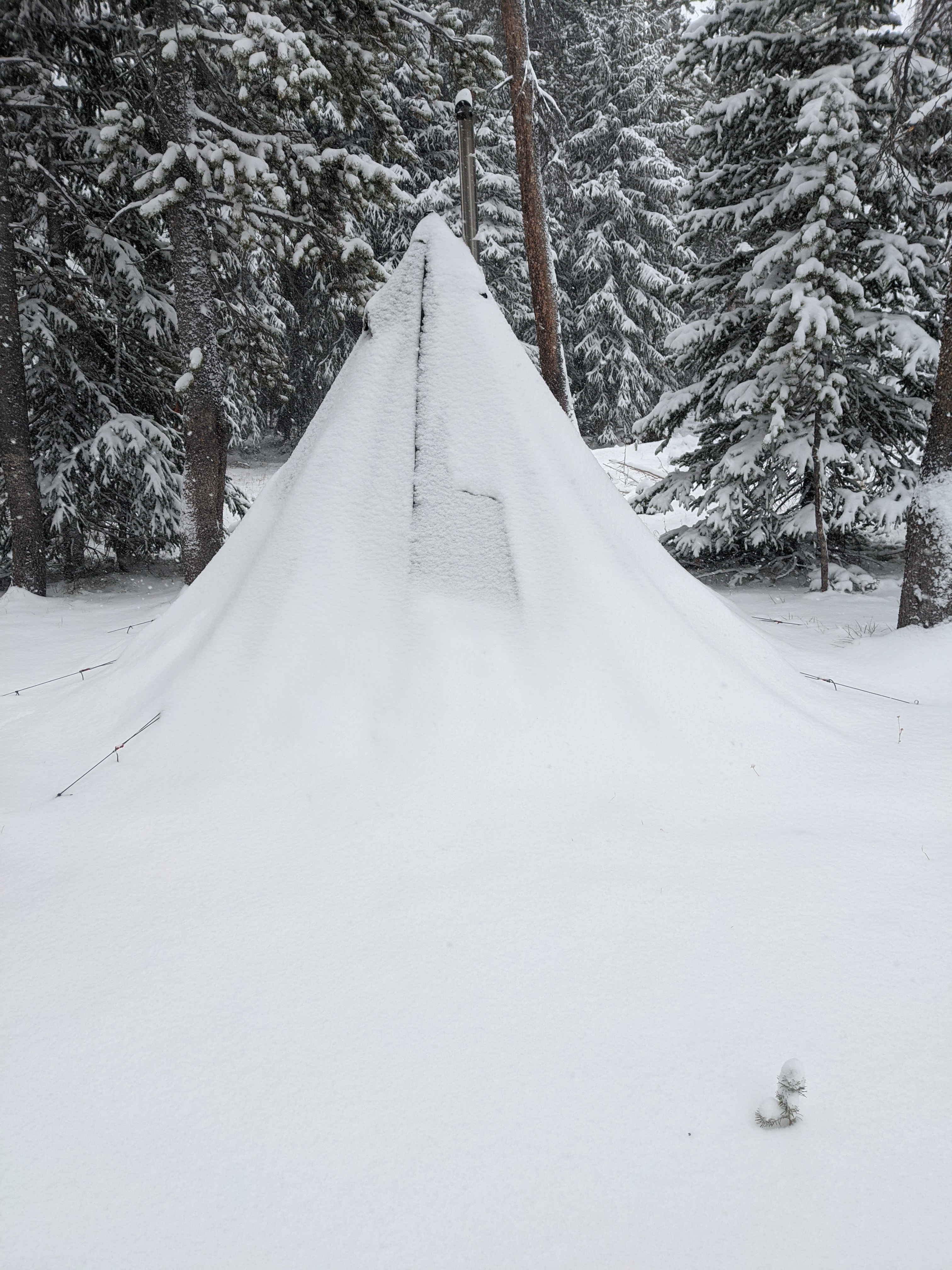 Our SeekOutside Tipi after a healthy amount of snow came down during elk season.